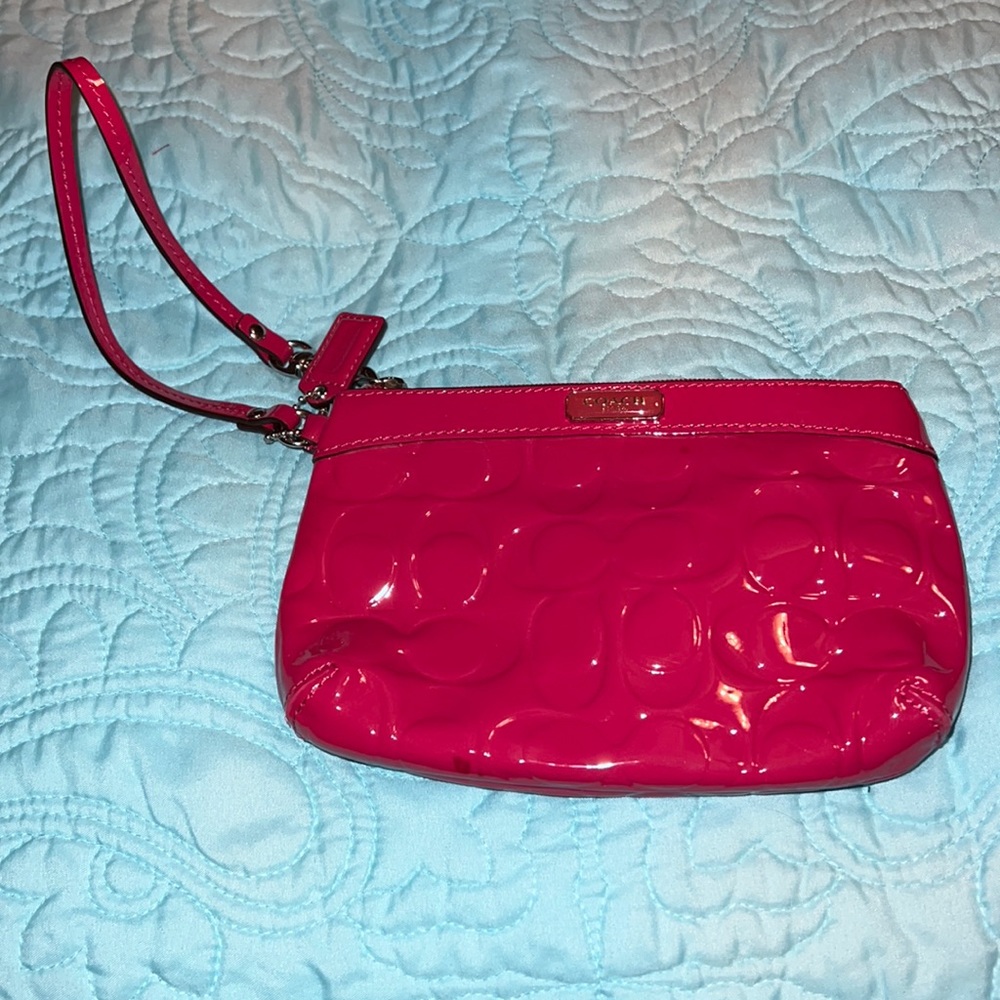 Hot pink Coach wristlet